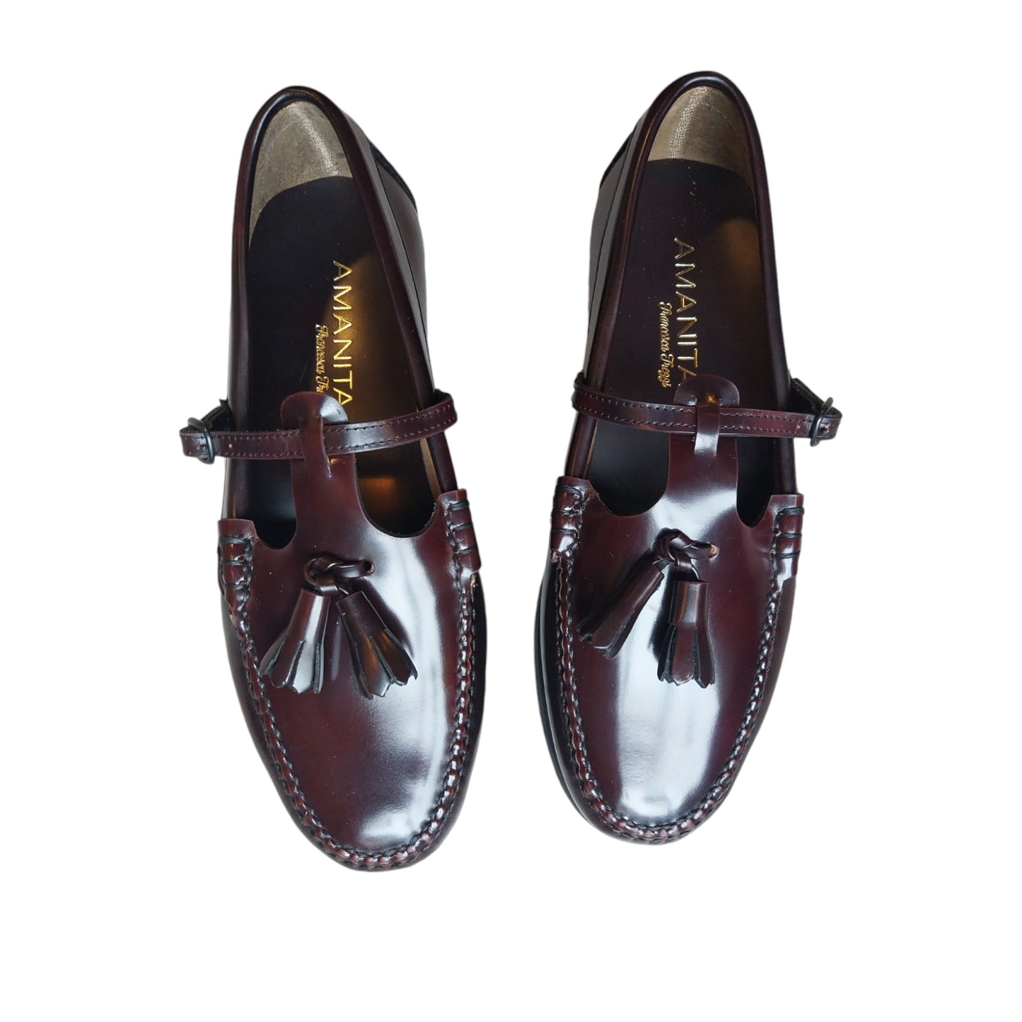 Mocassini in pelle marrone con laccio e nappine