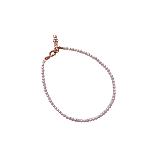 Bracciale oro rosa perline bianche