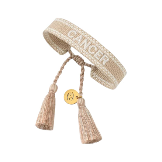 Bracciale in tessuto beige con scritta Cancer e charm