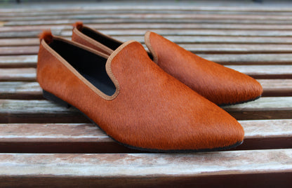 Slippers effetto cavallino cognac