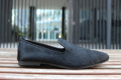 Slippers effetto cavallino nero