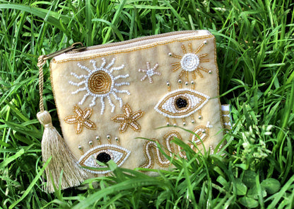Pochette ricamata Occhi portafortuna beige