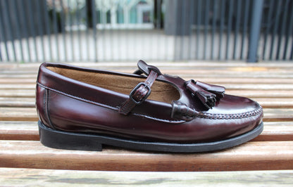 Mocassini in pelle con laccio e nappine bordeaux