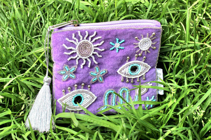 Pochette ricamata Occhi portafortuna viola